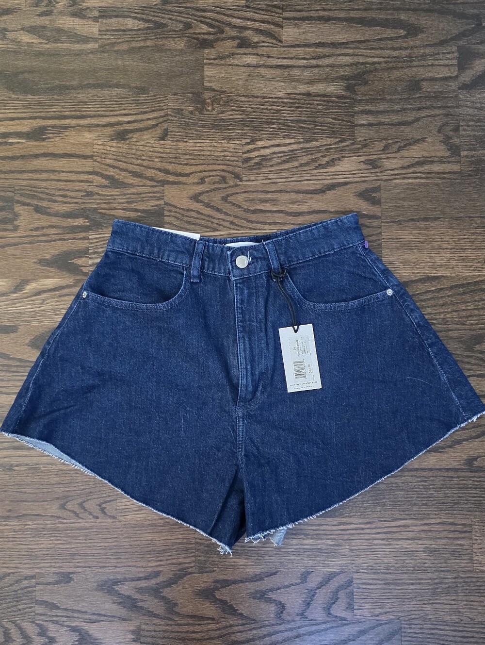 WEWOREWHAT Flare Bell Denim Shorts in True Blue, size 26.